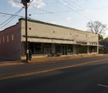 Three commericial spaces in this building. American Hometown Realty